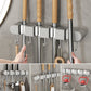🧹 KÖP 2 FÅ 1 GRATIS! 🚪 Multifunktionell Mopphållare med Krok – Platsbesparande, Stark Självhäftning & Perfekt För Hemorganisation 🏠