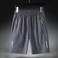 🩳 50% RABATT! 🔥 Herrars elastiska sommarshorts – Andningsbara, dragkedjefickor & stretchig passform – Perfekta för sport, resa eller varma dagar – bekväma och praktiska ☀️