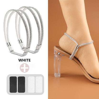 👠 KÖP 1 FÅ 1 GRATIS! ✨ Rhinestone Högklackat Fixeringsrem – Justerbar, Säker & Perfekt För Höga Klackar För Extra Komfort 💎