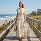 👗 50% RABATT! 🌸 Maxiklänning för damer med blommönster, V-ringning & smockad midja – Lätt, romantisk & perfekt för sommar, strand eller en dag i stan – bekväm hela dagen ☀️